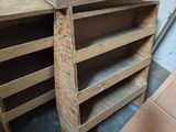 a stack of wooden pallets sitting on the floor