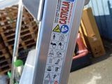 a close up of a parking meter with stickers on it