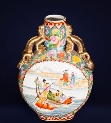 a vase with a picture of a boat on it