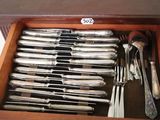 a drawer full of silverware with silverware in it