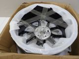 a box with a fan inside of it on the floor