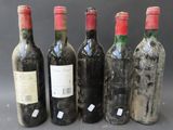six bottles of wine are lined up in a row