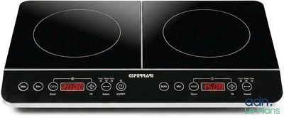 a close up of two burners on top of an electric stove