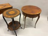 three small tables and a small table on a white background
