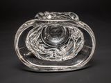 an image of a glass vase with a flower inside of it
