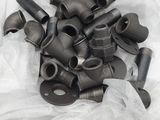 a lot of pipe fittings in a plastic bag
