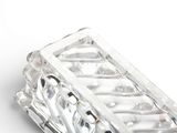 a clear glass container with a diamond design on it