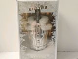 the box is open to show the contents of a bottle of jean paul gauttier
