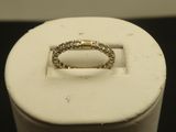 a ring that is sitting on top of a white box