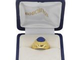 an image of a gold ring with a lapis stone in it
