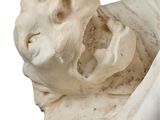 a statue of a man with a lion head on it ' s back