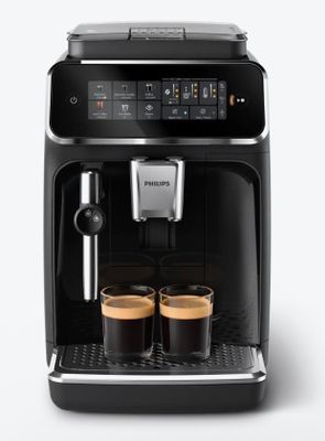 a close up of a coffee machine with two cups of coffee