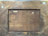 a wooden frame with a picture of a bird on it