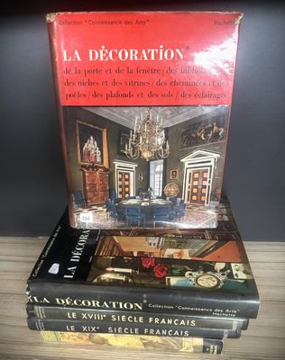 three books stacked on top of each other on a table