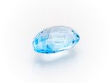 a blue topazte gems on a white background