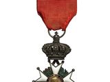 une image représentant une médaille ornée d'une étoile sur le recto