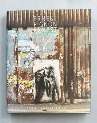a book with a picture of two dogs on the cover of it