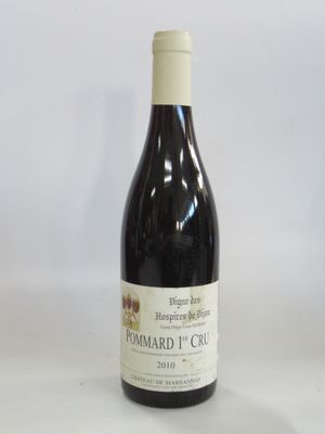 a bottle of wine that is sitting on a table
