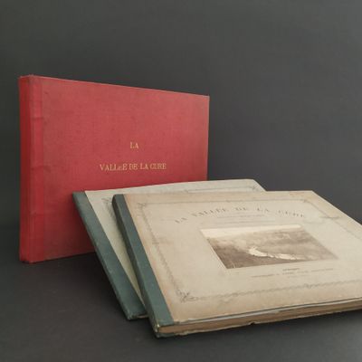 two books sitting on top of a table next to each other
