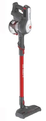 un gros plan d'un aspirateur rouge et noir sur fond blanc