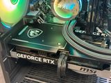 a close up of a computer case with a green light on it