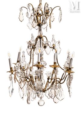 an image of a chandelier made of glass and brass