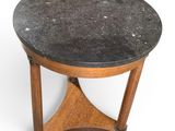 an image of a small table with a marble top on a white background