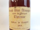 a bottle of alcohol that is sitting on a table