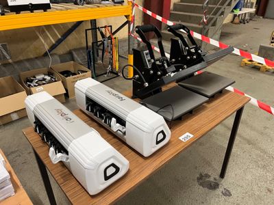 a table that has a bunch of different types of equipment on it