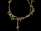a gold bracelet with a chain and a cross on it