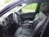 a picture of the interior of a car with a steering control