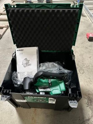 a tool box with a tool in it on the floor