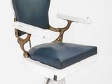 a white and blue chair with a blue seat on it