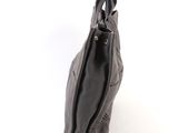 the back view of a black leather bag with a zipper
