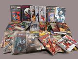 a lot of comic books sitting on a table