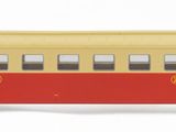 a toy train that is sitting on a white surface
