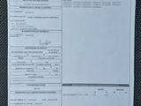an image of a document with a picture of a car on it