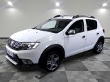 a picture of a white dacia parked in a room