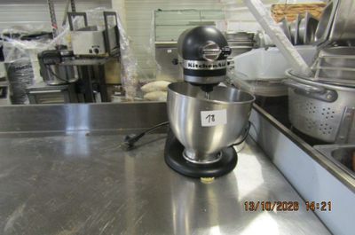 an image of a kitchen with a mixer on the counter