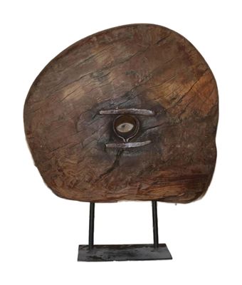 a large piece of wood with a hole in it