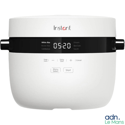 a digital clock displayed on the side of a rice cooker