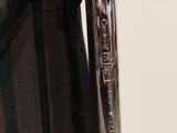 a close up of a metal handle on a luggage bag
