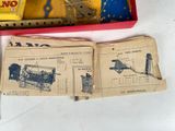 a box with a toy airplane inside of it on a table