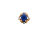 a blue stone and diamond ring