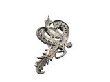 a close up of a silver brooch with a bird on it