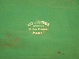 a close up of a green box with a label on it