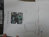 a person holding a piece of paper with a picture on it