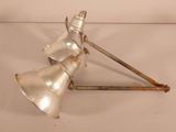 a silver light that is sitting on top of a table