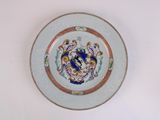 a plate with a blue and gold design on it