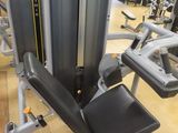 a machine that is sitting on the floor in the gym